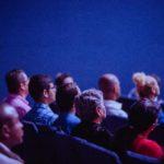 Photo by Luis Quintero: https://www.pexels.com/photo/people-sitting-on-gang-chairs-2774556/